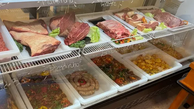 Fresh beef cuts, including maminha, alcatra and ribs, in the case at Costa's Meat Market