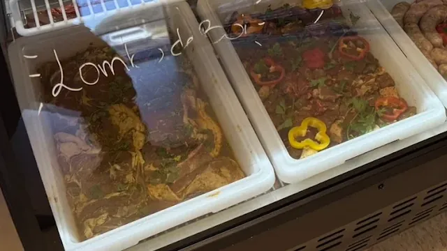 Seasoned pork in the case at Costa's Meat Market